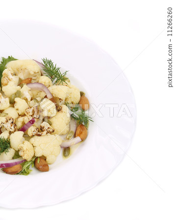 Cauliflower salad with nuts and red onion. Cauliflower salad with nuts and red onion. 11266260