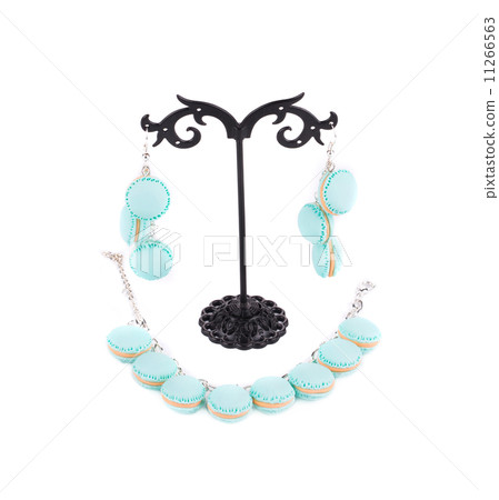 Bracelet and earrings on a stand. 11266563
