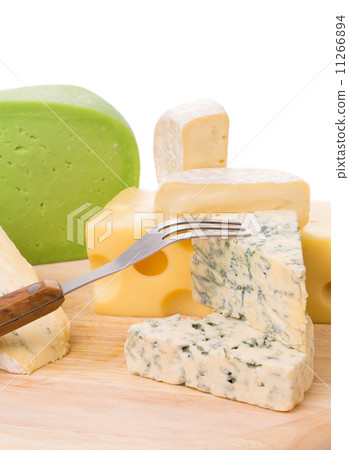Various types of cheeses on wood. Various types of cheeses on wood. 11266894