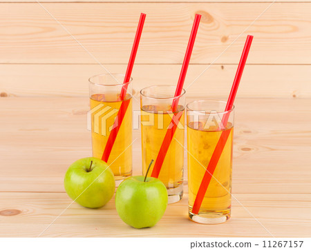 Fresh apple juice on wood. Fresh apple juice on wood. 11267157
