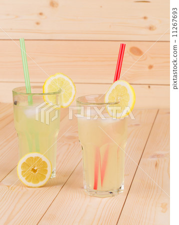 Three collins full of tasty cold lemonade. 11267693