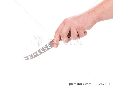 Hand holds cheese knife. 11267807