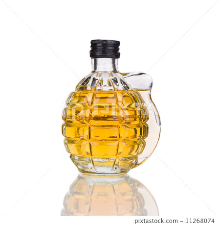 Glass of whiskey with grenade. 11268074