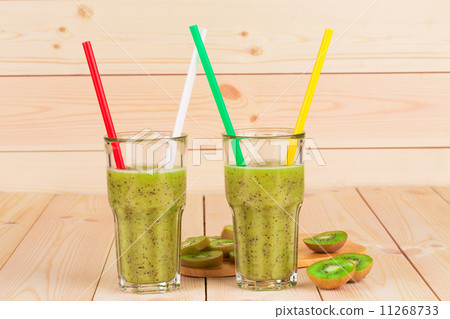 glasses full of tasty kiwi juice. glasses full of tasty kiwi juice. 11268733