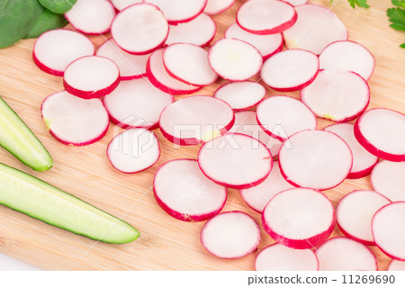 Sliced vegetables as a background. Sliced vegetables as a background. 11269690