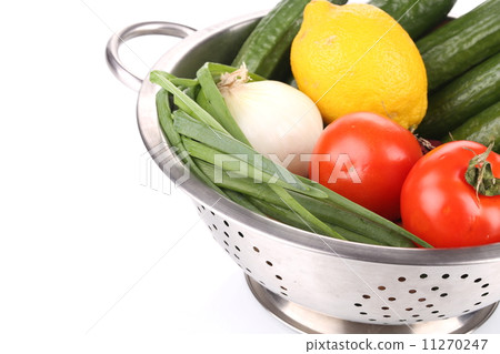 Vegetables in colander. 11270247