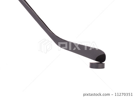 Black ice hockey stick and puck. Black ice hockey stick and puck. 11270351