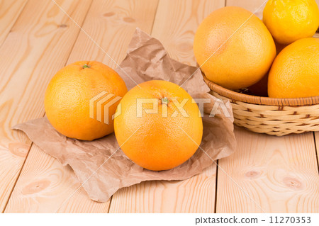 Citrus fruits grapefruit on wood. 11270353