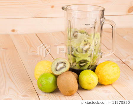 Blender full of sliced kiwi. 11270850