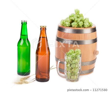 Barrel mug with hops and bottle of beer. Barrel mug with hops and bottle of beer. 11271580