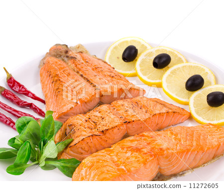 Grilled salmon fillets with rosemary. Grilled salmon fillets with rosemary. 11272605