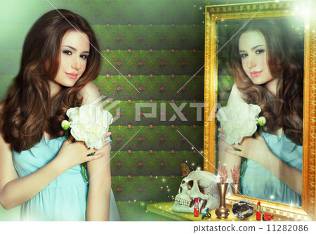 Mantra. Incantation. Woman Wizard Reflecting in Mirror 11282086