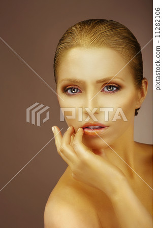 Pure Beauty. Gilded Woman's Face 11282106