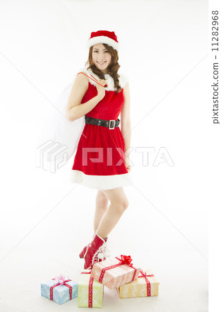 Santa girl with a present Santa girl with a present 11282968