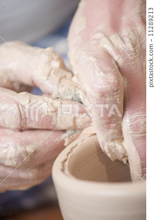 Hands of a potter Hands of a potter 11289213