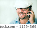 Young male engineer on the phone 11294369