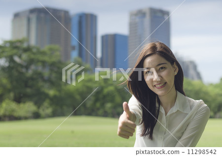 Happiness freedom concept. Woman happy smiling with arms up, asi 11298542