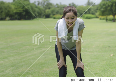 Asian women are tired after exercising 11298858