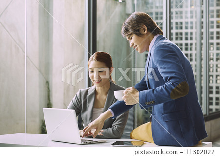 Business People Having Meeting Around 11302022