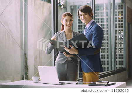 Business People Having Meeting Around 11302035