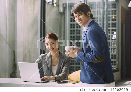 Business People Having Meeting Around 11302069