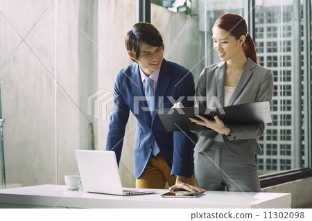 Business People Having Meeting Around 11302098