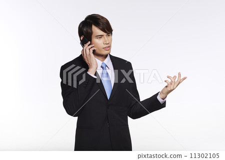 Portrait of Handsome Businessman Isolated on White Background Portrait of Handsome Businessman Isolated on White Background 11302105