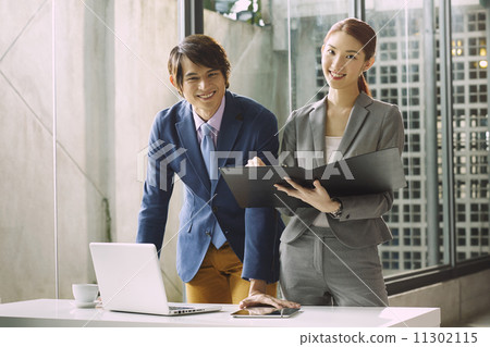 Business People Having Meeting Around 11302115