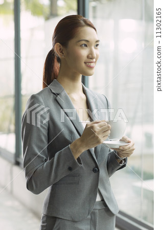 Young Business Female in Urban Setting Young Business Female in Urban Setting 11302165