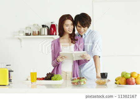Couple Cooking Healthy Food In Kitchen Lifestyle Meal Preparation 11302167