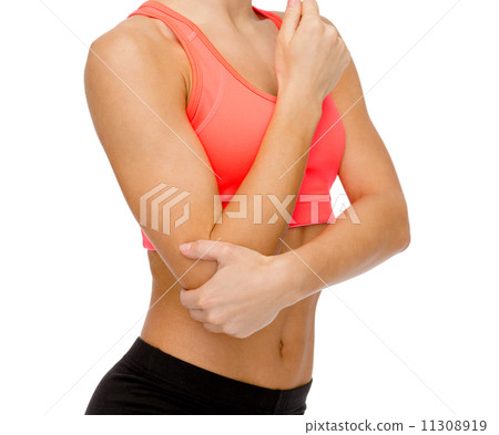 sporty woman with pain in elbow sporty woman with pain in elbow 11308919