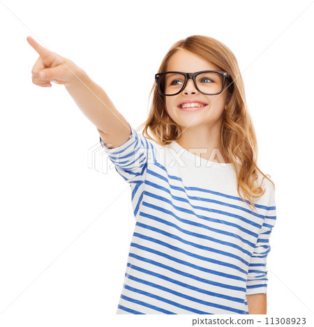 cute little girl in eyeglasses pointing in the air cute little girl in eyeglasses pointing in the air 11308923