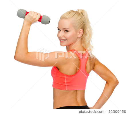 young sporty woman with light dumbbell 11309468