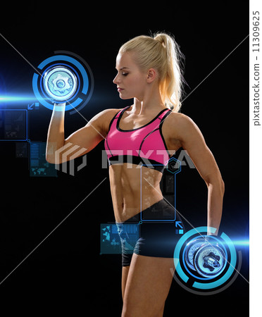 sporty woman with heavy steel dumbbells 11309625