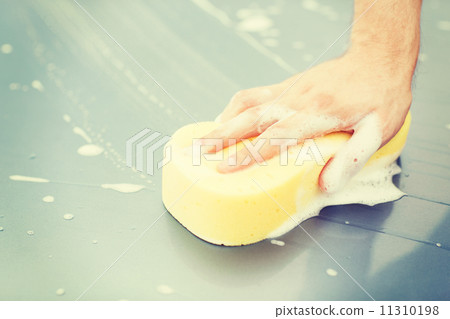 man washing a car man washing a car 11310198