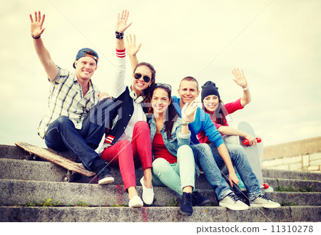 group of smiling teenagers hanging out 11310278