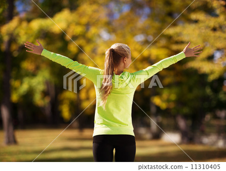 woman doing sports outdoors 11310405