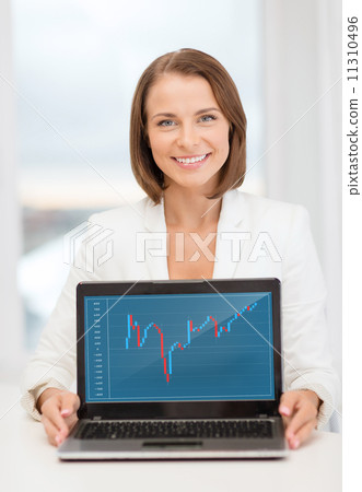 smiling businesswoman with laptop computer 11310496