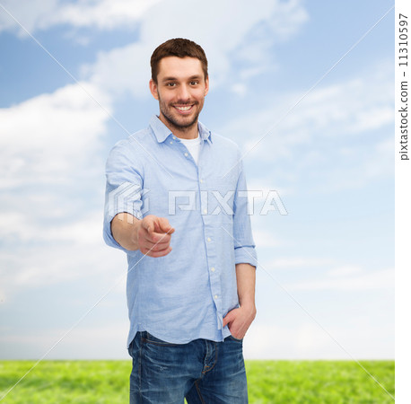 smiling man pointing finger at you 11310597