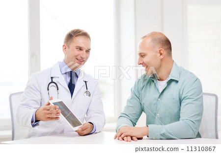 doctor with tablet pc and patient in hospital 11310867