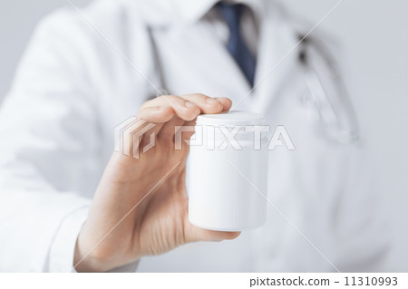 doctor hands holding white pack doctor hands holding white pack 11310993