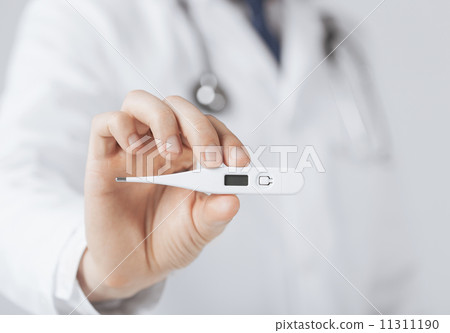 male doctor with thermometer male doctor with thermometer 11311190