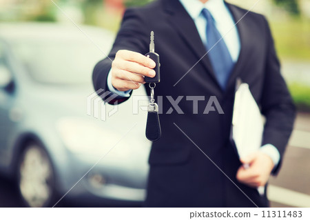 man with car key outside man with car key outside 11311483