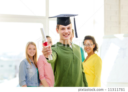 smiling male student with diploma and corner-cap 11311781