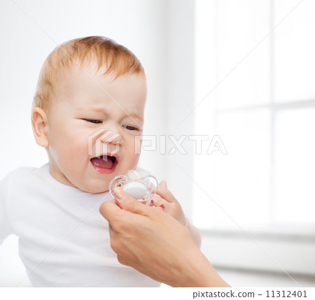 crying baby with dummy crying baby with dummy 11312401