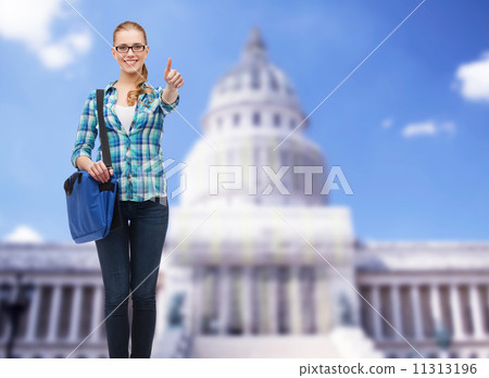 student with laptop bag showing thumbs up student with laptop bag showing thumbs up 11313196