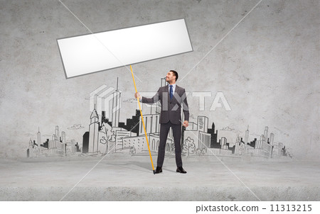 smiling businessman holding white blank board smiling businessman holding white blank board 11313215