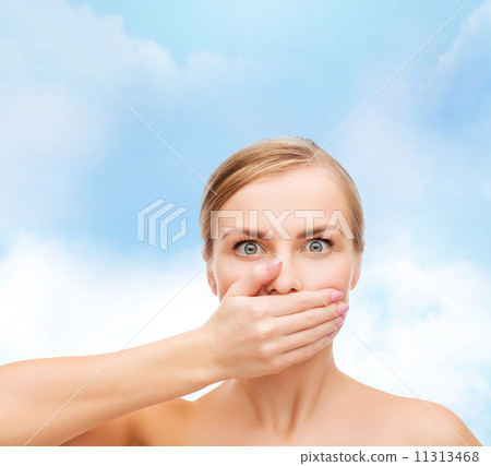 young woman doing hush gesrute young woman doing hush gesrute 11313468