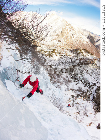 Climber on a ice fall 11313815