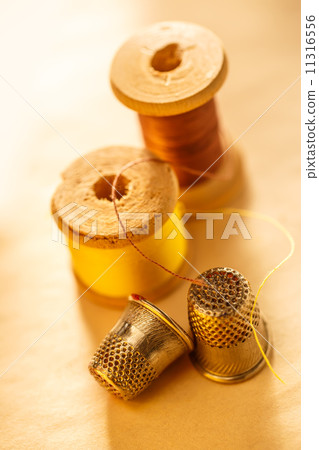 Thread bobbins and sewing thimbles Thread bobbins and sewing thimbles 11316556